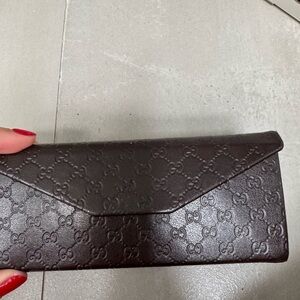 Gucci Dark Brown Embossed case